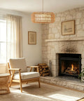 18 Inch Plug in Pendant Light, Boho Hanging Lamp with 15.7FT Light Cord illuminating a cozy seating area near a stone fireplace.