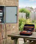 Built Tough Waterproof Multimeter Storage Case For MM325 MM420 MM69149P And More on a table near electrical panel
