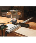 Top Shelf Router Dado Jig With CNC Machined Aluminum Carriage And One Inch Precision Bushing on workbench with router and guide.