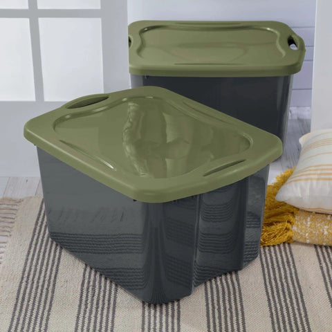 Roomy 17.5 Gallon Plastic Storage Bin With Secure Stackable Lid And Opaque Base, Full Grip Handles, Big Time Storage Container For Duds Bedding Dorm Gear And Zero Hassle Organization stacked with green lids on a striped rug.