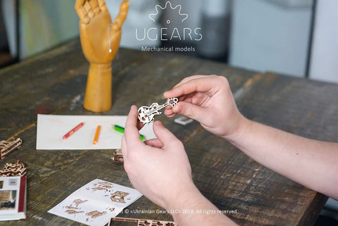 Wooden Fidget Creations Set Four Mini Mechanical Puzzles You Build Without Glue Or Tools, Stress Relief Toys For Adults And Kids, Portable Handcrafted Wood No Glue Needed Great For Focus And Calm, mini guitar model in hands