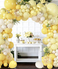 Epic 173 Piece Yellow Balloon Arch Kit With Double Stuffed Pastel Yellow White Sand Balloons And Clear Balloons For Wedding Bridal Shower Engagement Anniversary And Birthday Party Decor displayed with floral table setup.