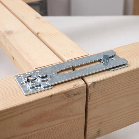 Heavy Duty Sectional Sofa Connectors 4 Pack Interlocking Alligator Style Couch Couplers lock wooden beams together with a metallic clip.