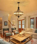 Modern Black Crystal Chandelier With 5 Lights, Farmhouse Style Dining Room Fixture in a stylish living room.