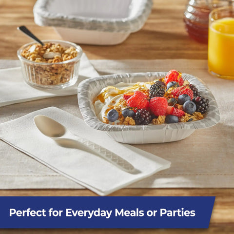 Eco Friendly Compostable Spoons For BBQs Parties And Camping 24 Count Durable Disposable Cutlery on napkin beside fruit bowl