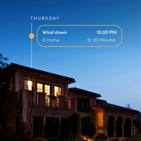 Evening scene of a house with smart lighting controlled by Crazy Bright Supercolor BR30 Smart Flood Bulbs 2 Pack RGB Plus Tunable White