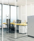 Beast Mode 32U Gray Floor Standing Server Rack Cabinet 35 Inch Deep With Built In Cooling Fan Removable Side Panels Locking Glass Door in office.
