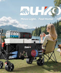 49 Inch Collapsible Heavy Duty Wagon With 500 Pound Capacity All Terrain Wheels near a lake, loaded with camping gear and supplies