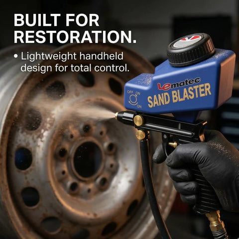Portable Sand Blaster Gun Kit for Air Compressors with gravity feed, removing rust from a wheel, close-up view