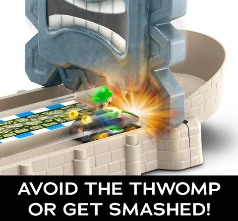 Luigi kart in Hot Wheels Mario Kart Thwomp Ruins Track Set with Thwomp obstacle and track details.