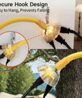 Heavy Duty 2 Ft 12 Gauge Outdoor Extension Cord With 3 Outlets And Indicator Light Waterproof SJTW Cable 15A 125V 1875W For Workshop ETL Listed Flexible Yellow showing secure hook and waterproof design.