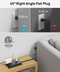 Surge Protector Power Strip With USB Ports And 10ft Extension Cord, ETL Listed, showing flat plug behind couch