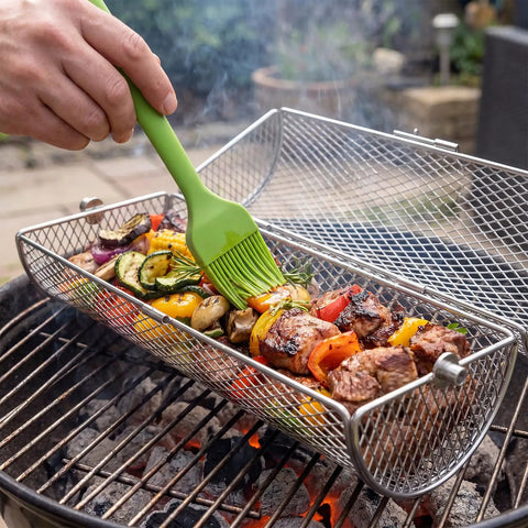 2 In 1 Rolling Grill Basket With Rotating Stand And Hooks Heavy Duty Stainless Steel Rotatable BBQ Mesh Cylinder in use on grill
