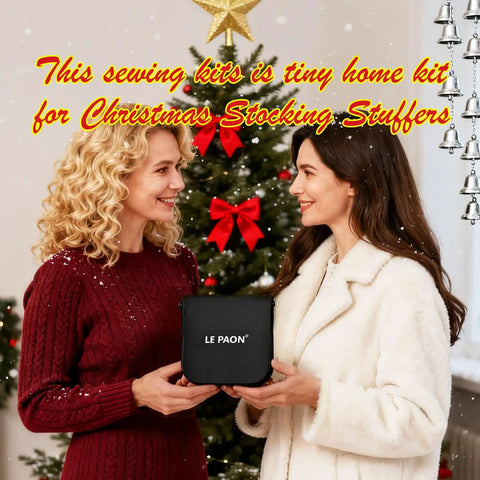 Two women exchanging a Grab And Go Portable DIY Sewing Kit For Travelers And Beginners Black Size Small against Christmas backdrop.