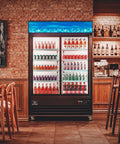 Kickass Commercial Merchandiser Refrigerator Delivering Rock Solid 45 Cubic Foot Storage With Eight Roomy Shelves For Chill Beverage Display At Bars Restaurants Or Retail Spaces showcasing colorful drinks in a modern setting.
