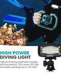 Scuba diver using Underwater LED Video Light 700 Lumen High Power Waterproof For GoPro And DSLR Cameras in deep sea.