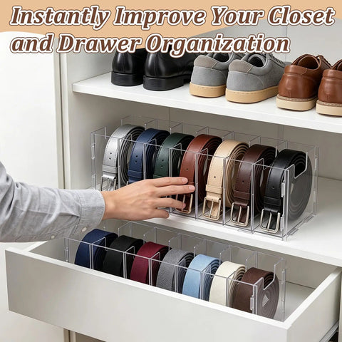 Top Shelf Slick Acrylic Belt Organizer With Removable Dust Cover Seven Compartment Clear Drawer Storage For Ties Belts Bow Tie Purse Socks Straight Up Closet Solution with belts neatly stored.