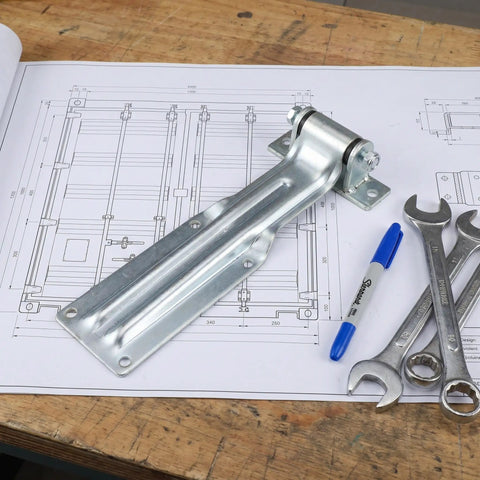 Built Tough Heavy Duty Vehicle Door Hinge For Utility And Semi Trailers With Anti Corrosion Finish Keeps Cold Storage Temperature Stable And Is Ideal For Freezers, Refrigerated Vehicles, And Garage Door Replacements. Galvanized steel hinge on technical drawing