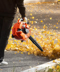 Gas Powered Handheld Leaf Blower 28cc Two Stroke With 475 CFM 200 MPH Wind Lightweight Yet Mighty in use clearing leaves
