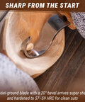 Left Handed Hook Whittling Knife Cut From Heavy Duty Carbon Steel For Easy Bowl And Kuksa Turning showing chisel-ground blade in wooden bowl.