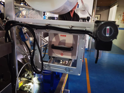 High Speed Auto Screw Packing And Counting Machine For Screw Kits, focused on light screen positioning unit.