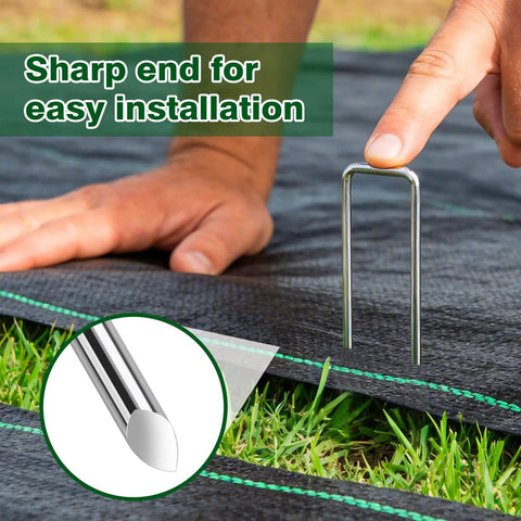 Beefy 6 Inch Landscape Staples 11-Gauge Galvanized U Shaped Yard Pins being used to secure weed barrier fabric
