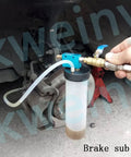 Pneumatic Fluid Extractor Drainer For Automotive Brake, Clutch, And Power Steering Fluids in use on car brake system.
