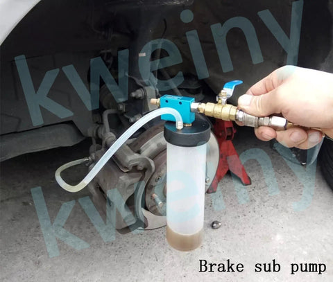 Pneumatic Fluid Extractor Drainer For Automotive Brake, Clutch, And Power Steering Fluids in use on car brake system.