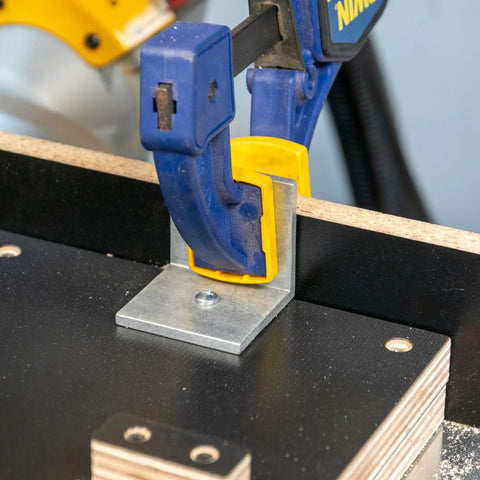 Professional Grade Miter Saw Jig Delivering Dead Nuts Accurate Cuts Without Any Sweat Featuring Its Rock Solid Angle Guiding Mechanism close-up of angle clamp on jig