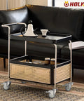 Locking Three Inch Expanding Stem Caster Wheels Set Of Four For Adjustable Tables, Carts And Furniture Legs shown on a bar cart