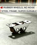 Built Tough 0.5 Inch Double Roller Mini Caster Wheels With Flat Steel Mount, close-up of steel frame and rubber wheels.
