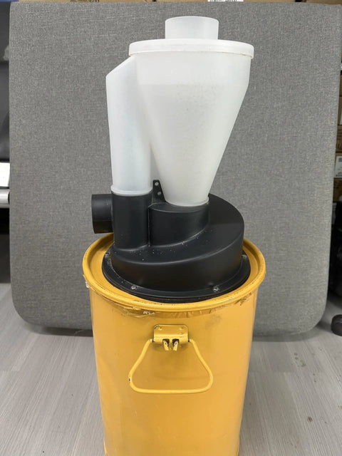 Turbocharged Dual Filtration Cyclone Dust Collector For Woodworking With Two Point Five Inch Hose on yellow canister