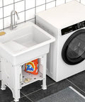 Freestanding Plastic Laundry Sink With Detachable Washboard For Indoor And Outdoor Use 25.4 Inch Wide By 22 Inch Deep By 31.5 Inch Tall Utility Sink adjacent to washing machine