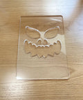 Kickass Acrylic Router Template For Jack O Lantern Faces With 8 Durable Halloween Pumpkin Patterns 5.5X8 Inch solid clear polymer mask on wood.