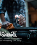 Man using Slim Mini Rechargeable Pocket Light for EDC and Emergencies, 250 Lumens, Two Modes, Magnetic Base in car engine bay