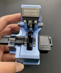 Boss Level Mt 09 Fiber Cleaver Automatic Cable Cutting Knife For Ftth Installations, blue housing, precision fiber cutting tool.