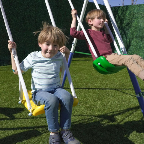 Children playing on Durable Metal Backyard Swing Set For Kids With Two Swings Roman Glider Teeter Totter And 5 Ft Wave Slide