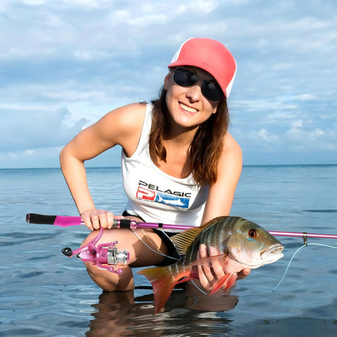 Smiling woman with Pink Ladies Telescopic Fishing Pole And Reel Combo Kit For Women And Girls All In One Beginner Friendly Starter Kit