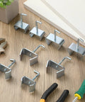 4 Pack 1-1/4 Inch Bed Frame Rail Clamps And Connectors Heavy Duty Zinc Plated Hardware on wooden surface with tools.