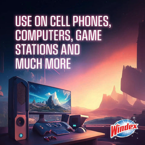 Gaming setup with computers, controllers, and virtual landscape showcasing usability of ammonia-free wipes on electronics.