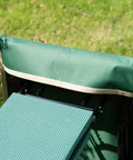 Close-up of Heavy Duty Garden Kneeler And Seat With Large Four Pocket Tool Bag showing EVA foam pad and green fabric.