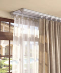 Beefy Heavy Duty Double Curtain Track Set With Ceiling Mount Aluminum Rail For Living Room, Adjustable 3 To 13 Feet, Room Divider Track System, Includes Curtain Slide, Pulleys, Hooks, Clips, Screws And End Caps installed above window with sheer and beige curtains