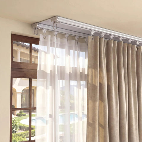 Beefy Heavy Duty Double Curtain Track Set With Ceiling Mount Aluminum Rail For Living Room, Adjustable 3 To 13 Feet, Room Divider Track System, Includes Curtain Slide, Pulleys, Hooks, Clips, Screws And End Caps installed above window with sheer and beige curtains