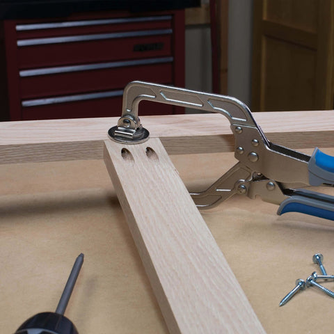 Automaxx Auto-Adjust Clamp Pressure Technology Wood Project Clamp 3 Inch Face Clamp holding wooden boards in carpentry workshop