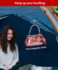 Two Pack Heavy Magnetic Hooks For Outdoor Use, Premium Neodymium Tent Hooks With 15-Pound Capacity holding a handbag in tent