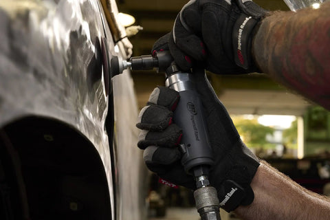 Compact Right Angle Pneumatic Die Grinder With 1/4 Inch Collet And 20000 Rpm Motor Built Like A Tank For Tight Spaces And Heavy Duty Grinding Cutting Or Polishing Jobs No Nonsense Workhorse For Auto Fabrication Trades in use on metal surface.