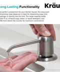 Spot Free Stainless Steel Soap And Lotion Dispenser With Self Priming Pump dispensing liquid into hand in bathroom.