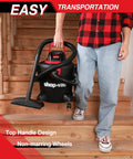 Person carrying a 5 Gallon Wet Dry Vacuum With 2.0 Peak HP Power, Portable Shop Vacuum for Home Garage Workshop and Car down stairs