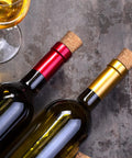 Wine bottles sealed with assorted tapered cork stoppers from the Assorted Tapered Cork Stoppers Set, 25 Pieces, Five Sizes