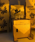 Cozy 13.5 Inch Pineapple Lantern Wooden Farmhouse Decor with laser-cut butterfly and hummingbird designs in warm lighting